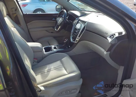 2014 Cadillac Srx Luxury Collection z USA, uszkodzony, nr VIN 3GYFNBE39ES583575